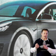 Elon Musk in front of an image of a Tesla